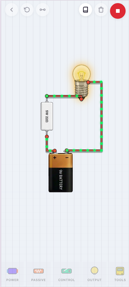 Sandbox simulation with a glowing bulb, battery, resistor, and animated current flow